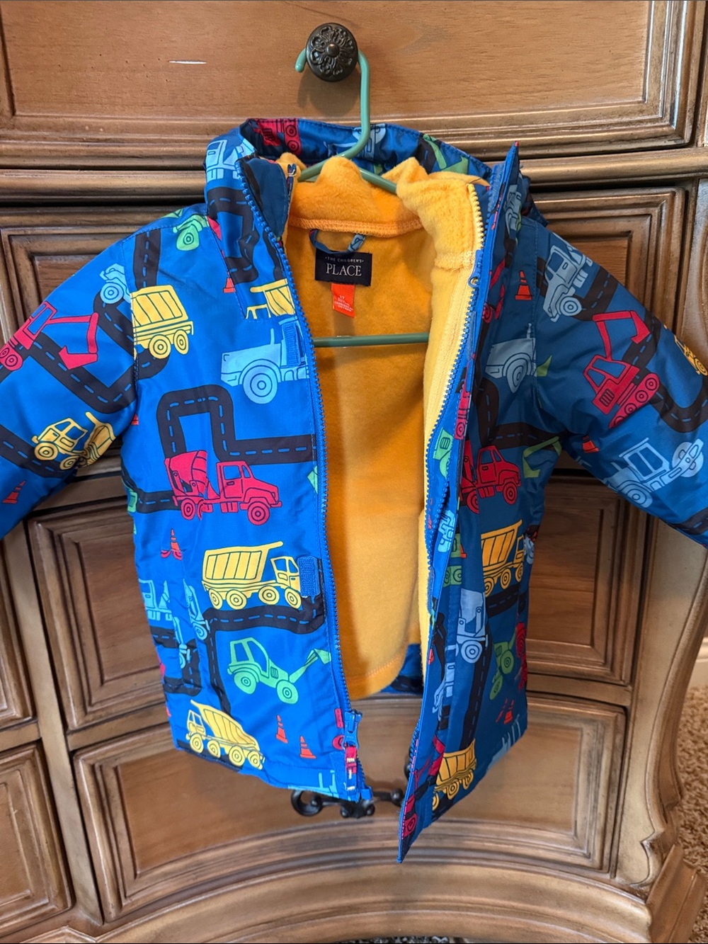 The Children's Place Blue Construction Trucks Jacket with Yellow Fleece Lining